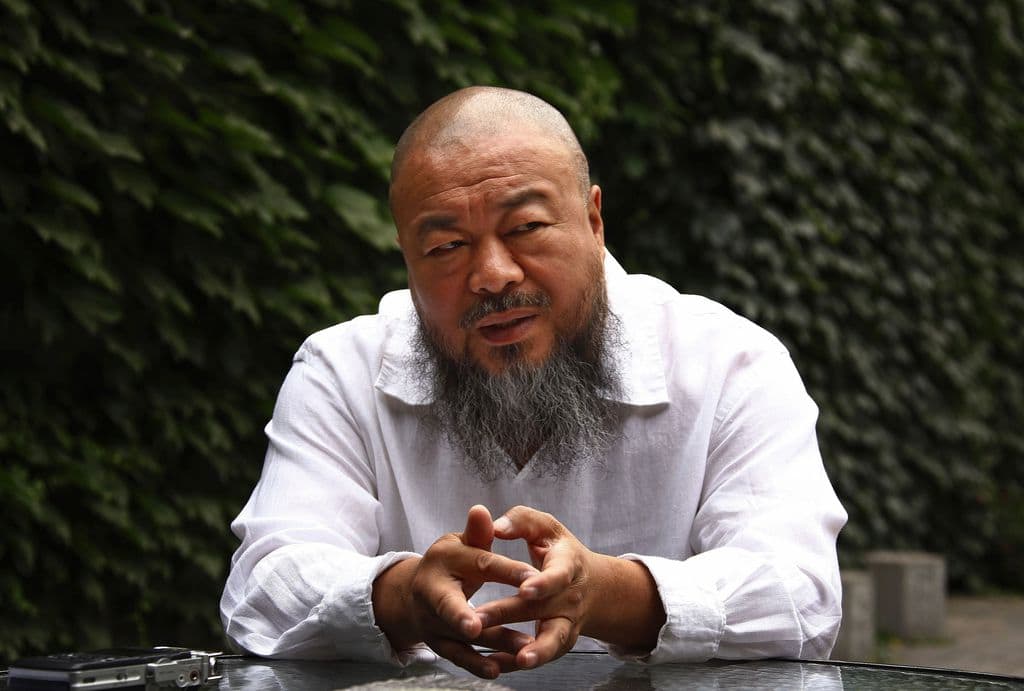 Dissident Chinese artist Ai Weiwei answers a question during an interview at his studio in Beijing May 29, 2012. REUTERS/David Gray